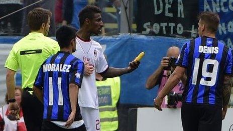 AC Milan defender Kevin Constant picks up banana