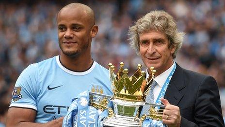 Manchester City captain Vincent Kompany and manager Manuel Pellegrini