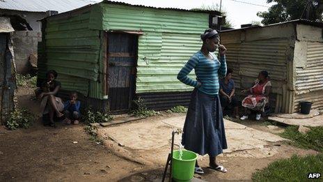 Relatives of striking miners are seen idling in the impoverished informal camp just outside the South African Platinum hub of Marikana