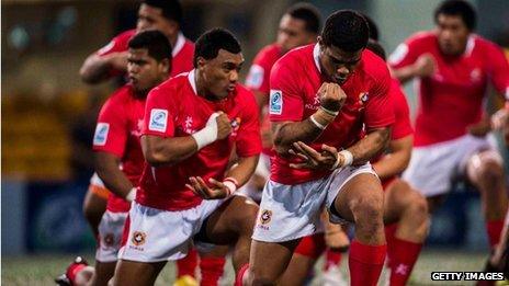 Tonga players perform the haka