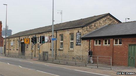 The building at the railway station (now a Hull City Supporters' club) that migrants passed through