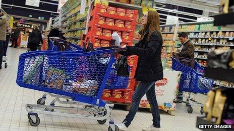 Woman pushing supermarket