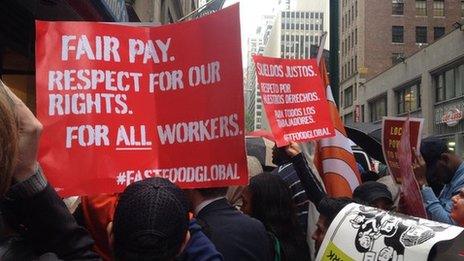 Fair Pay respect for our rights sign and protestors