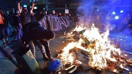 People take part in protests against the upcoming World Cup along the streets of Sao Paulo, on May 15, 2014.