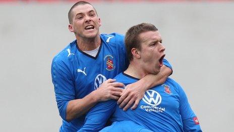 Les Davies of Bangor City celebrates scoring a goal