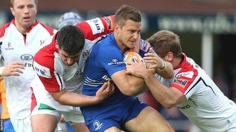 Ulster pair Ricky Lutton and Chris Henry tackle Jimmy Gopperth