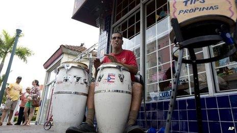 Pablo Gonzalez Portilla plays drums on a street in Miami's Little Havana neighbourhood