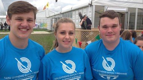 Baton bearers Dafydd Rees, Erin Williams and Huw Rowlands