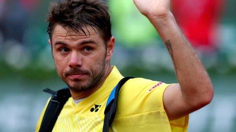 Stan Wawrinka waves goodbye after losing in Paris