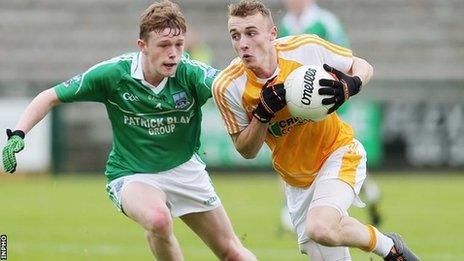 Fermanagh's Enda Cassidy challenges Seamus McGarry