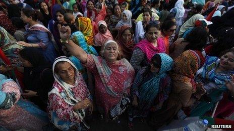 A supporter of Pakistan's Muttahida Qaumi Movement (MQM) political party chants slogans along with others during a protest demonstration against Amnesty International in Karachi May 8, 2014