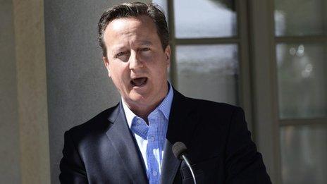 David Cameron speaking at a press conference after the four-power gathering in Sweden