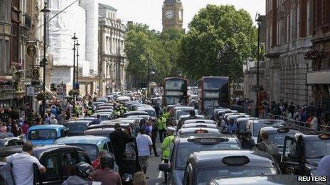 Taxi drivers block the road in Whitehall