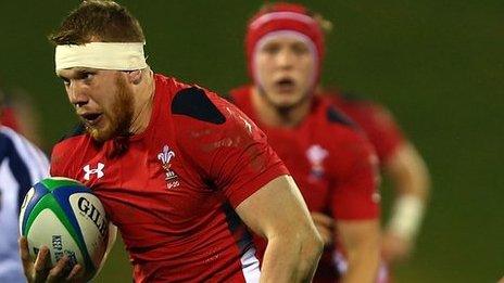 Jack Dixon makes a break for Wales Under-20