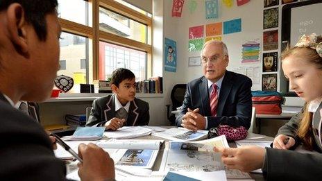 Sir Michael in a classroom