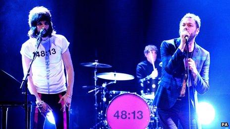 Kasabian on stage