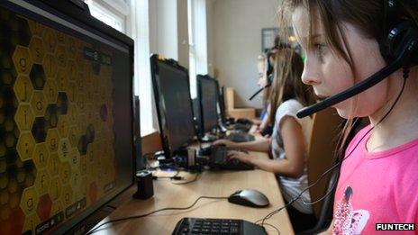 young girls learning to code