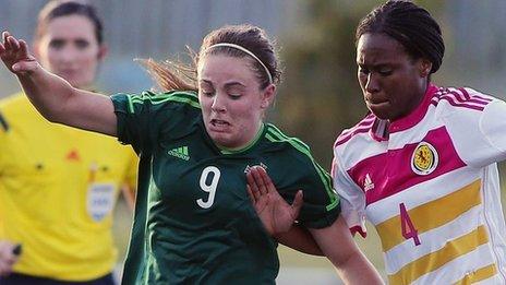 Northern Ireland's Simone Magill in action against Ifeoma Dieke of Scotland