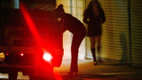 A driver looks for prostitutes in Pomona, California