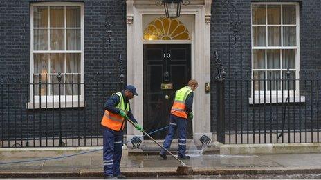 Cleaners outside 10 Downing Street