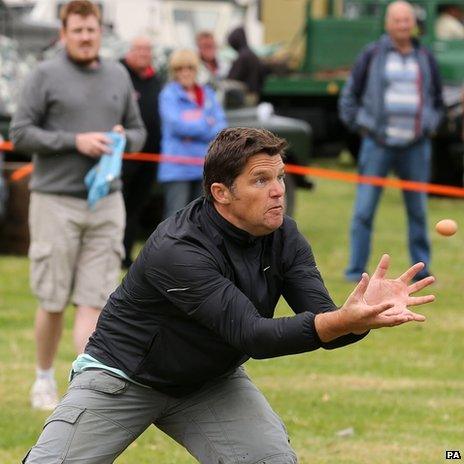 Man catching egg