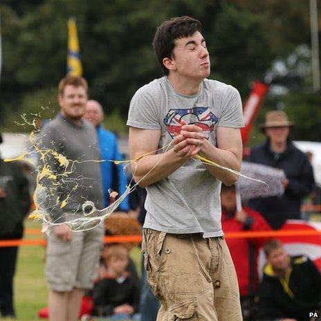 Man catching egg