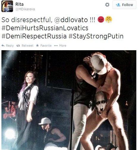 A tweet showing the kiss at Demi Lovato's show. Tweet says 'So disrespectful'.