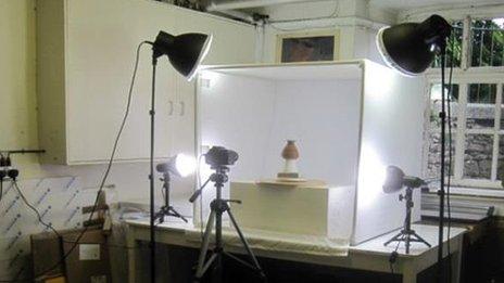 Ancient Egyptian artefact being photographed