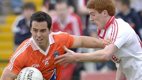 Aaron Kernan of Armagh with Tyrone's Peter Harte