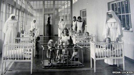 Nuns and children in a dormitory at Sean Ross Abbey (photo from the 1950s courtesy of Brian Lockier)