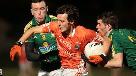 Meath pair Andrew Tormey and Donal Keoghan challenge Armagh forward Jamie Clarke