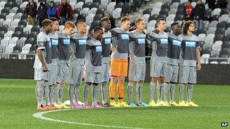 Newcastle United players standing in a line