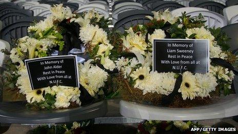 Wreaths in memory of John Alder and Liam Sweeney placed on seats