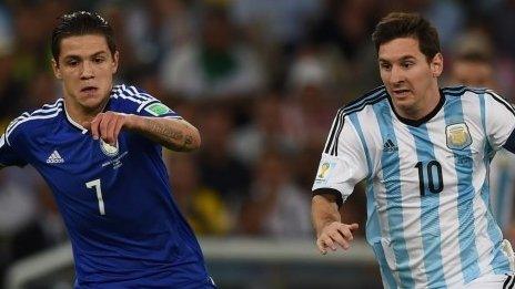 Muhamed Besic and Lionel Messi