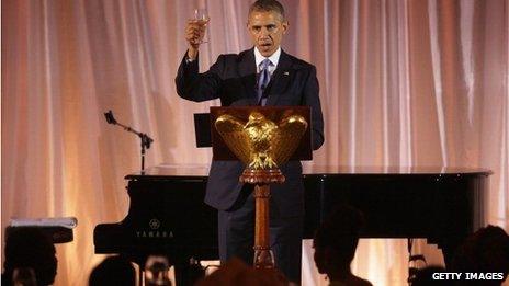 President Obama raises a glass