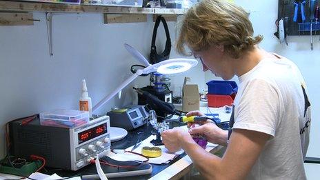 Man using 3D printer in a studio