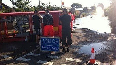 Fire crews in March helping to pump out flood water