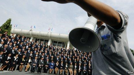 Thai members of the National Legislative Assembly (NLA) poses for a group photo before voting for the new prime minister at Parliament House in Bangkok, Thailand, 21 August 2014