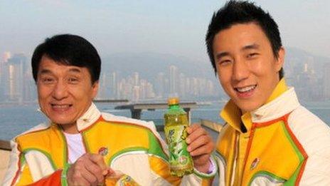 Jackie Chan and his son Jaycee attend a commercial advertisement taping on 21 January, 2009 in Shanghai, China