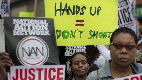 Demonstrators protest over the death of 43-year-old Eric Garner in New York (23 August 2014)