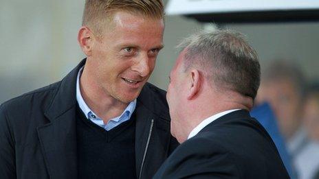 Garry Monk with Rotherham United manager Steve Evans