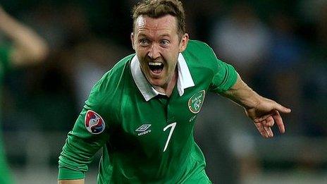 Aiden McGeady turns away in delight after scoring the late winner against Georgia