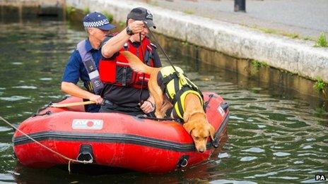 Police sniffer dog handlers search for Alice Gross