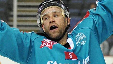 Evan Cheverie of the Belfast Giants celebrates scoring the third goal against the Edinburgh Capitals