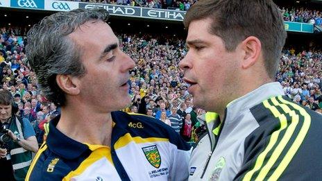 Donegal manager Jim McGuinness congratulates Kerry boss Eamonn Fitzmaurice