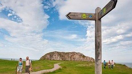 Visitors walking the coastal path