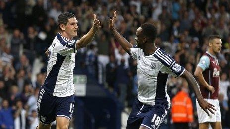 Graham Dorrans and Saido Berahino celebrate