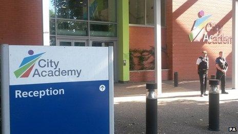 Police officers stationed outside City Academy