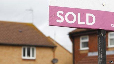 Sold sign outside house