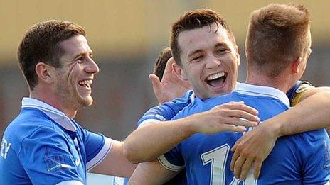 Chris Hegarty celebrates after scoring for Linfield against Ballymena United